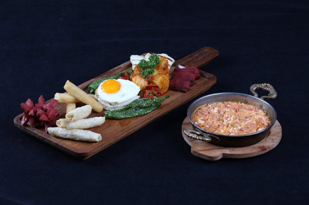 A plate of food with a bowl of food on it